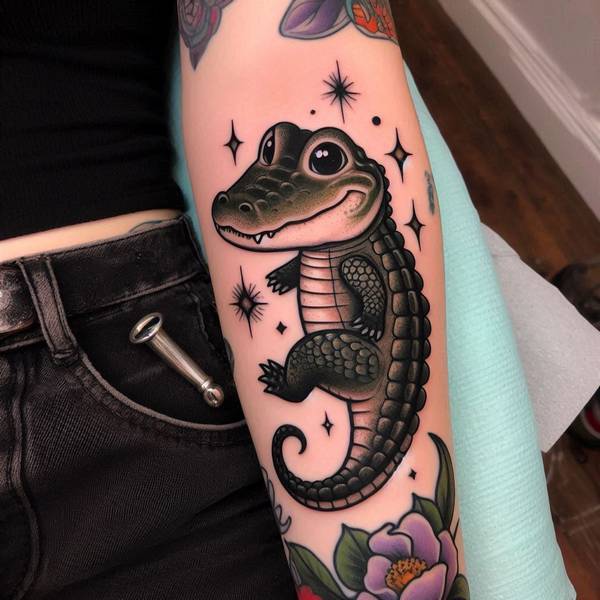 15 Powerful Alligator Tattoo Ideas To Entertain Your Morbid Curiosity 13 Feminine Alligator Tattoo 10f90