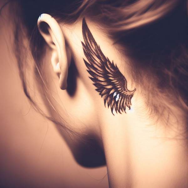 25 Majestic Angel Wing Tattoos: Explore Unique Designs for a Bold and Mystical Look 20 Angel Wing Tattoo Behind The Ear4d11
