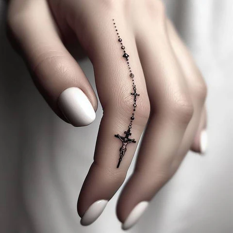 Rosary Finger Tattoo